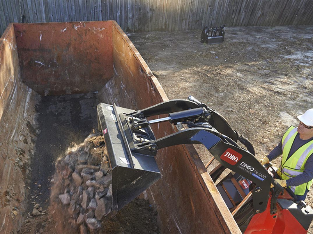 Mini Skid Dingo® TX-1000-WT Toro con angolo di scarico 40°